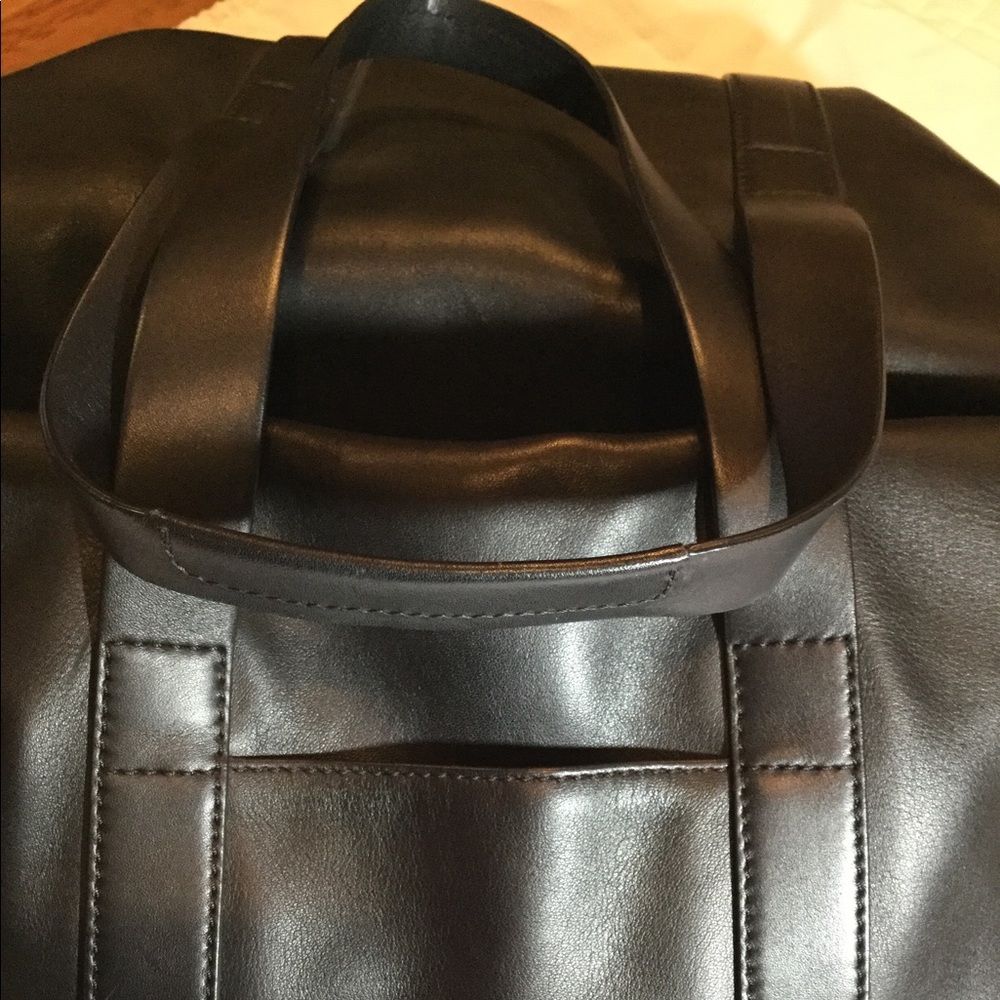 Aritzia’s Six Eleven black leather McDuffle - Picture 13 of 14